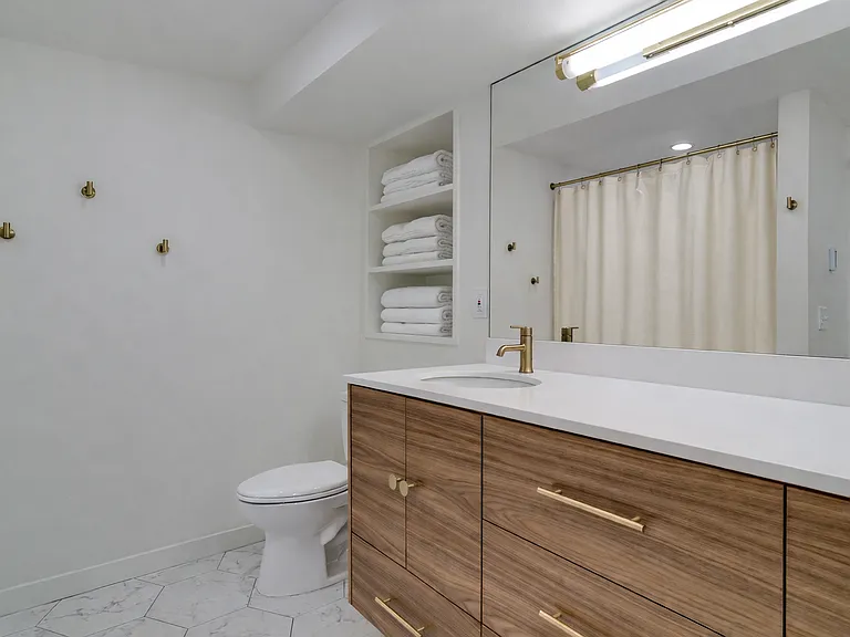 Full bath with his/her double sink
