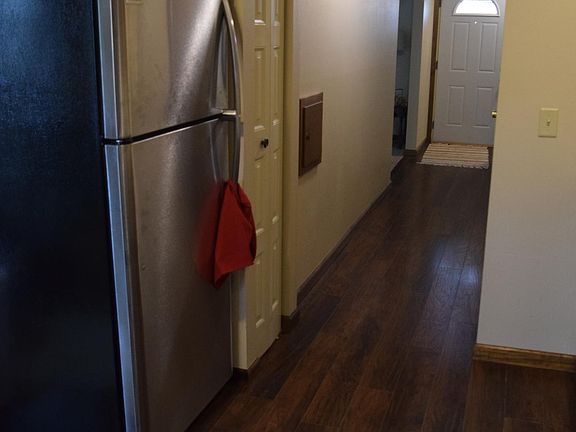 Kitchen has black appliances (not stainless steel as shown).