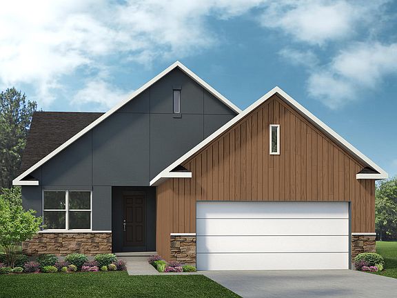 Elevation E - Optional Includes stucco finish. Garage door style is optional.