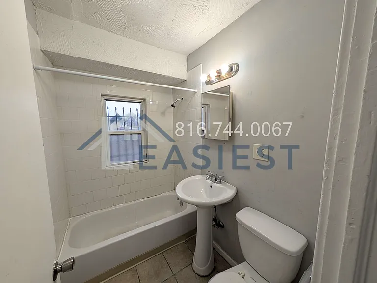 5400 Woodland Ave — Photo 12