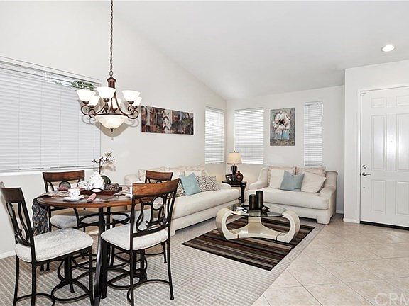 A view from the entry into the family room looking towards the entry.