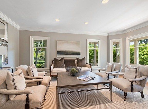 This room is wrapped with large windows and natural light.