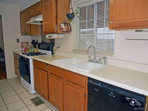 Updated kitchen with dishwasher, gas stove and lots of cabinetry