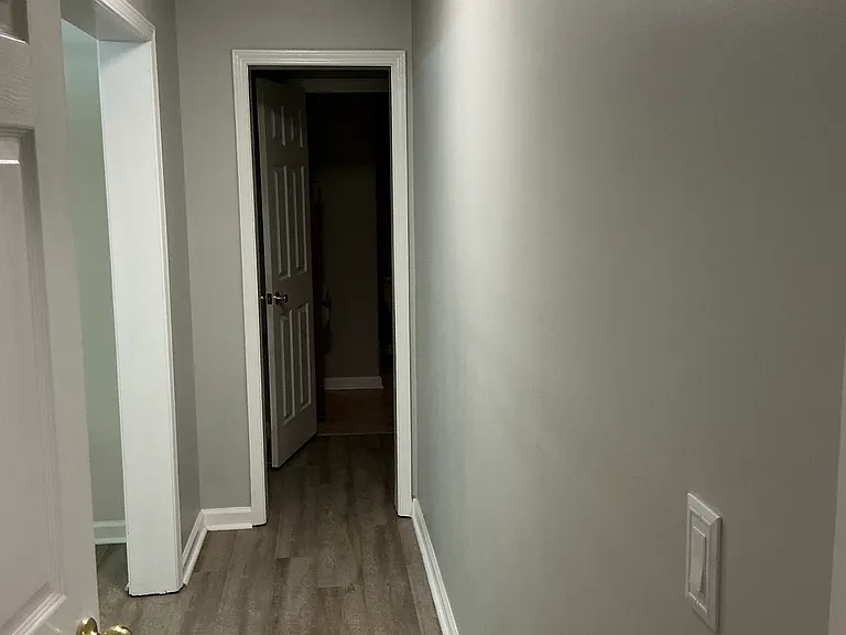 Main Hallway with Kitchen Entry on Left
