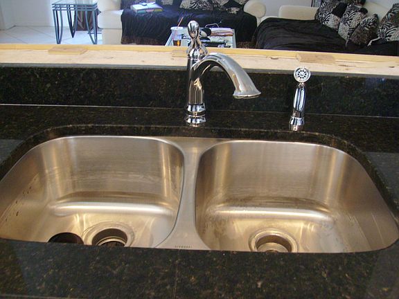 new faucet ,stainless steel sink,garbage disposal installed in 8/2011