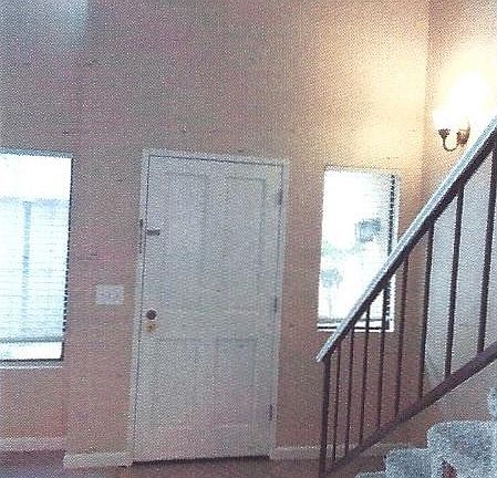 Front Door w/Stairway to Second Floor