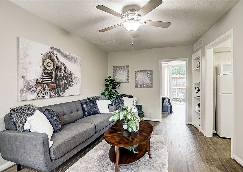The living room has a clean, comfortable feel.