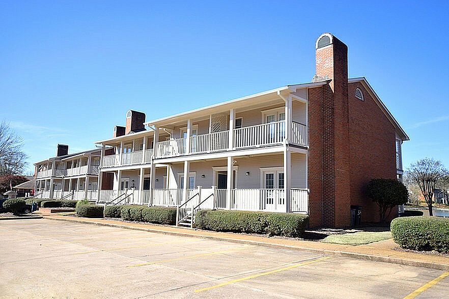Experience comfortable living in this charming apartment complex, perfect for those seeking tranquility.