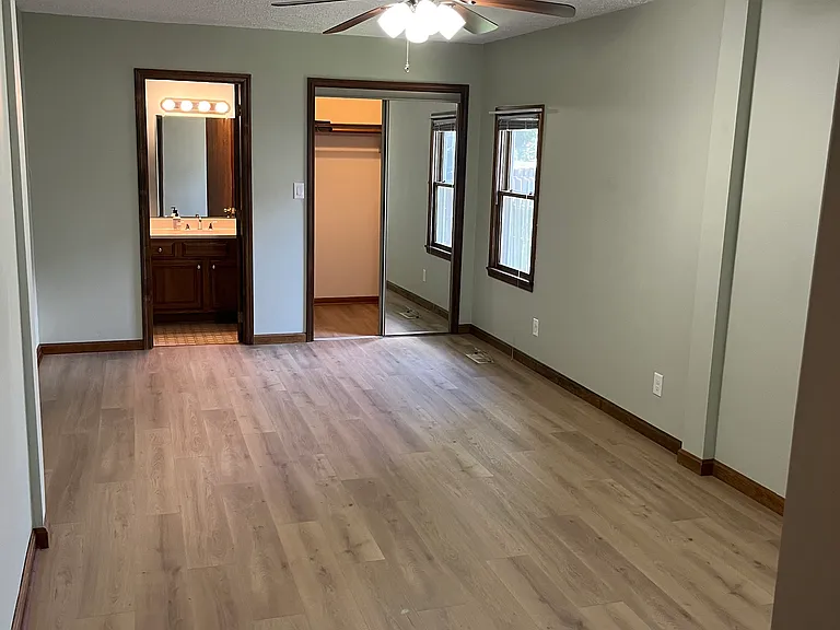 Master Bedroom... walk in closet, 1/2 bathroom.