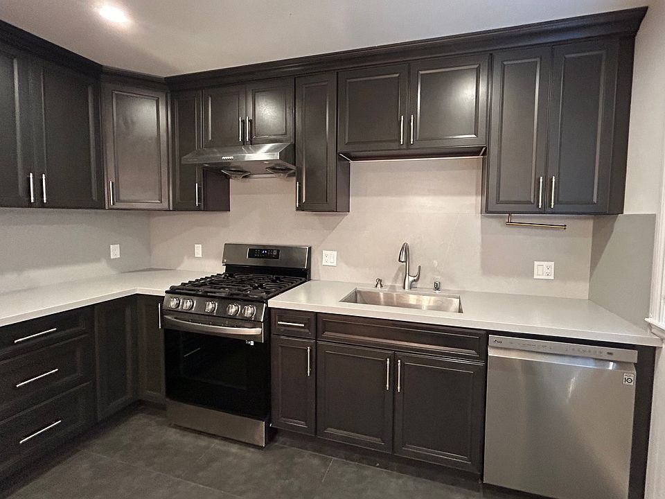 Kitchen with stainless steel appliances and granite countertops