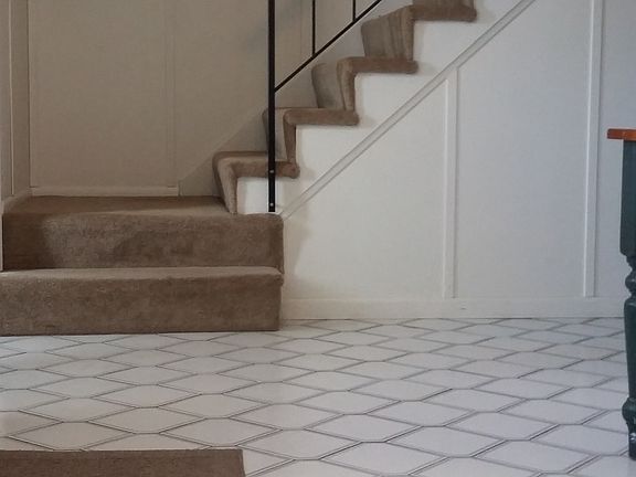 Entryway and stairs to second floor