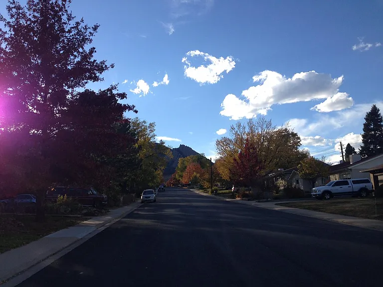 Our street. Mountains are way closer in real life. We run or hike up to the base of the flatirons from our house.
