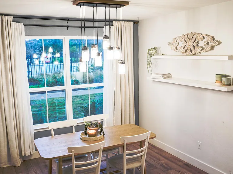 Spacious & modern dining room with a private, open view to the pool!