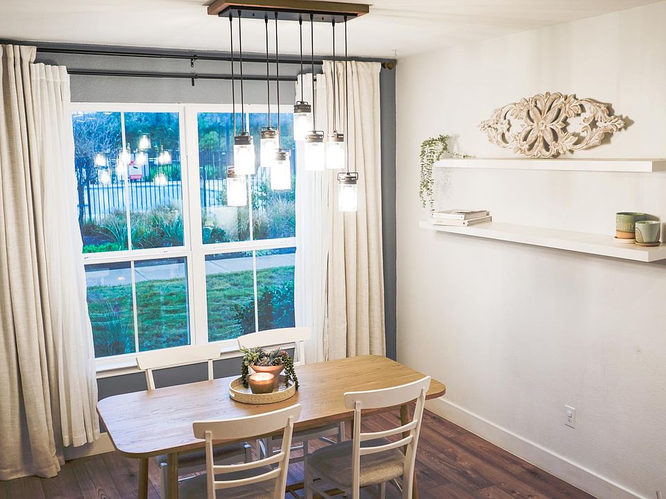 Spacious & modern dining room with a private, open view to the pool!