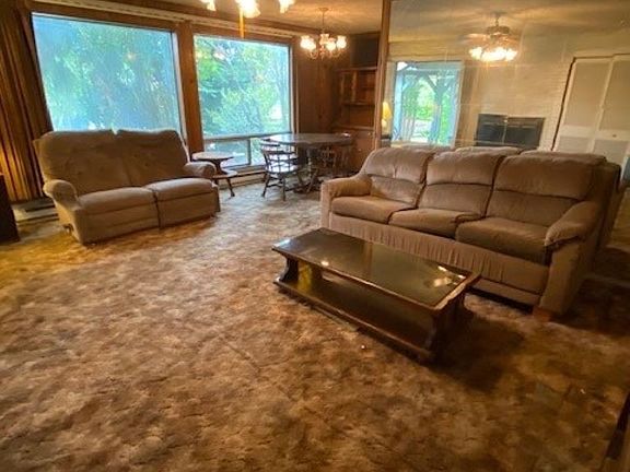 Spacious Open Living & Dining Areas greet you as you enter the home.