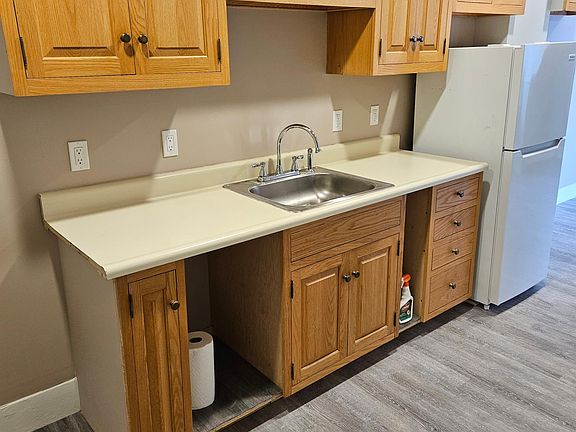 All new Oak kitchen cabinets, with a 30 inch stove
