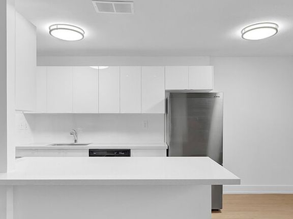 2nd image of 671 Woolwich St #208