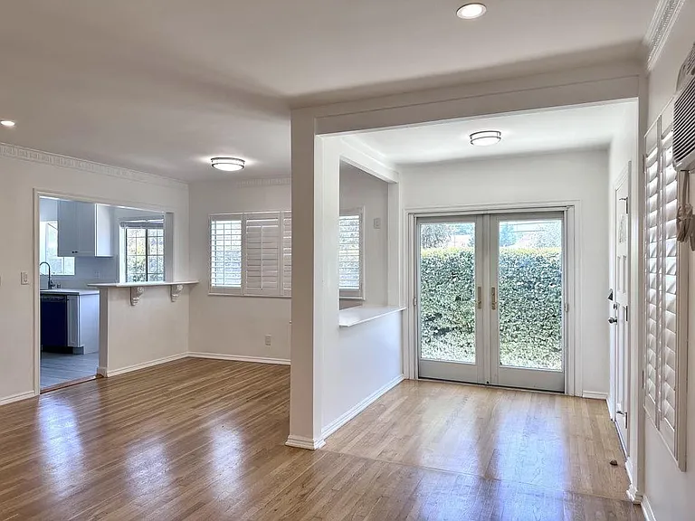 French doors leading out to private patio