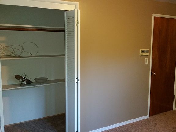 one of three bedroom closet