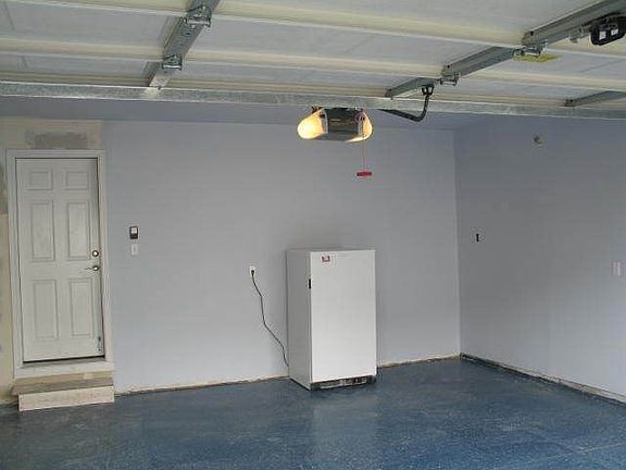 Finished 3 car garage - 2 car side. All painting now finished.