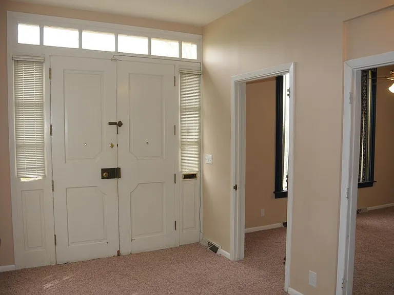 Entry/Dining into Living Room now has Vinyl wood look floors and new paint color