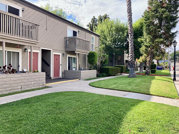 Sidewalk view of Solana Park Apartments in Solana Beach, California.
