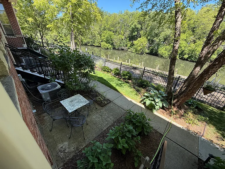 Front patio, East view of river.