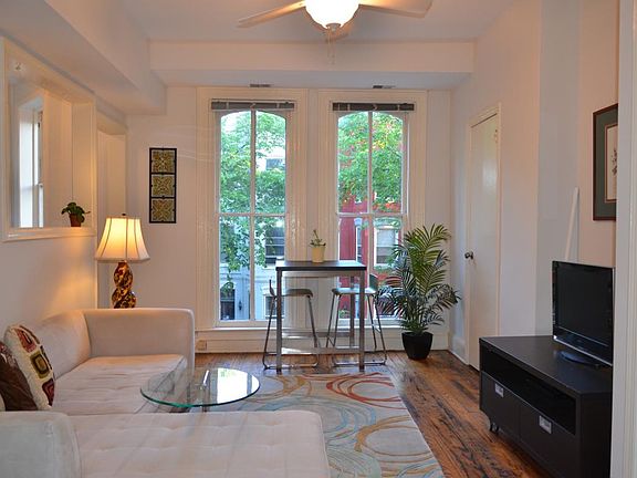 Floor to ceiling windows facing South