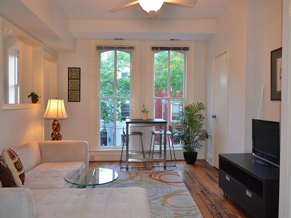 Floor to ceiling windows facing South