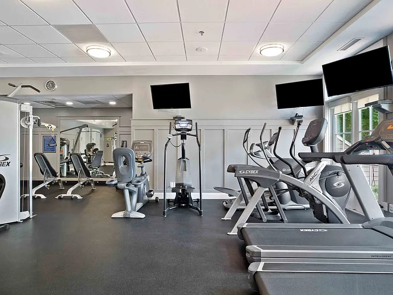24-hour fitness center with cardio equipment