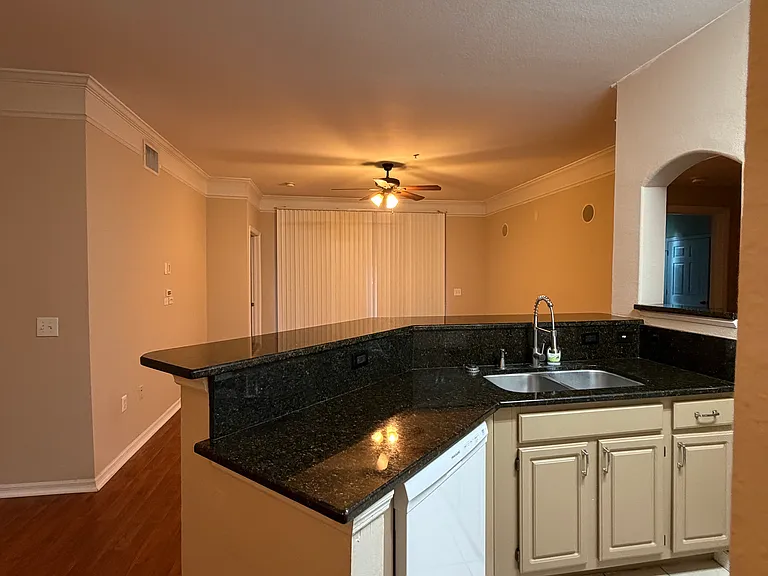 The spacious kitchen counter provides plenty of room for cooking and meal prep.