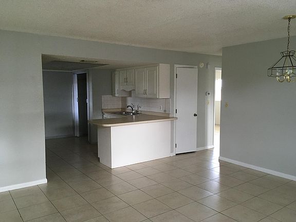 Living room looking at kitchen