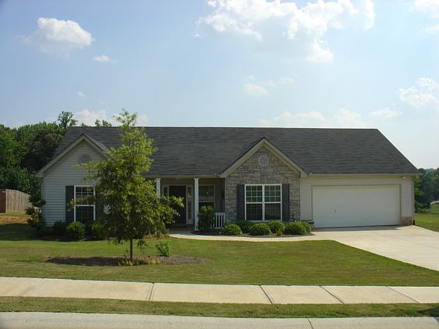 Nearly New 3 Bed, 2 Full Bath home on over 3/4 of an acre!