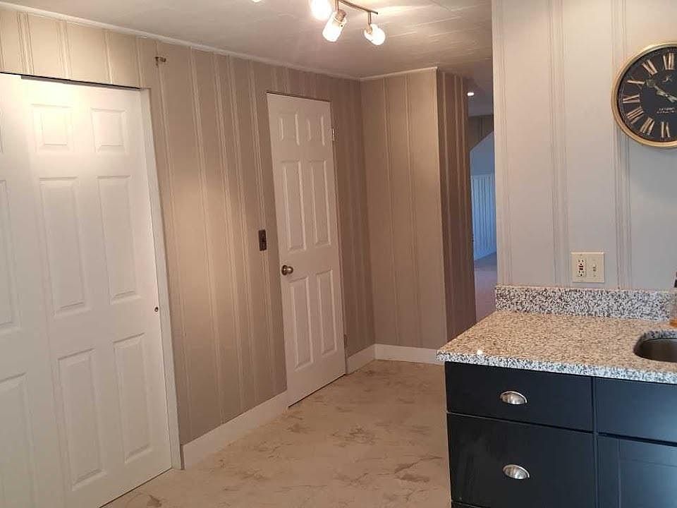 Eat in sized kitchen with new laminate cabinets and granite 