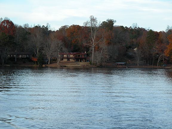 on the water looking at house