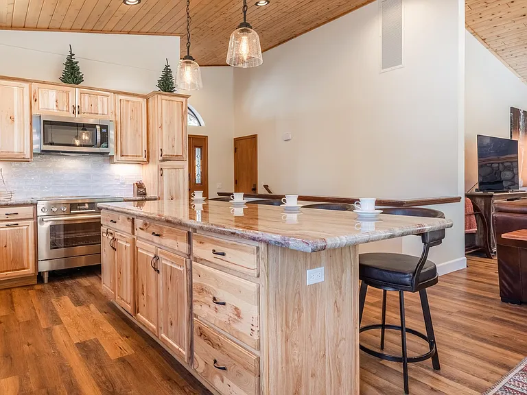 Chef's kitchen opens to living room