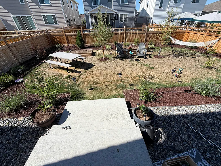 Professionally landscaped backyard and full fencing.