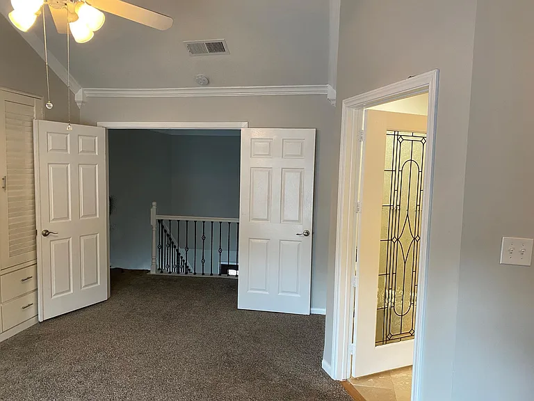Master suite has room for workout equipment or settee.