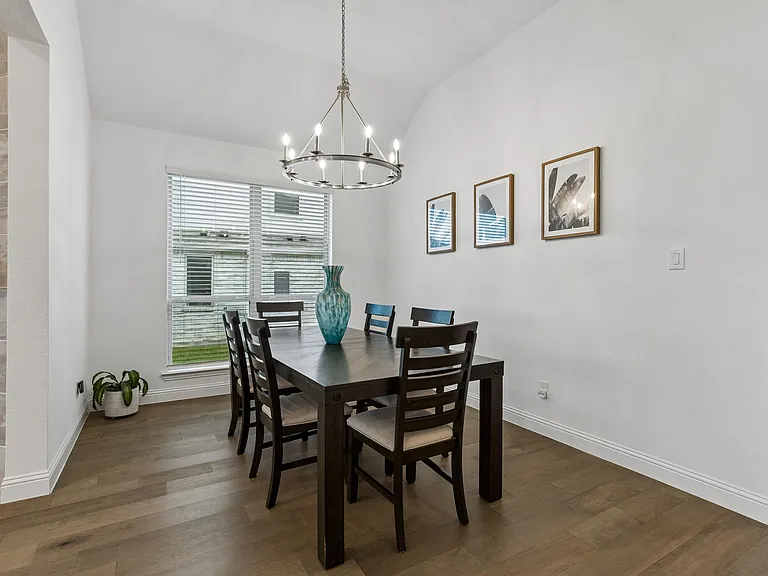 The number of dinner party guests just got bigger!. There is plenty of space for a large dining table here.