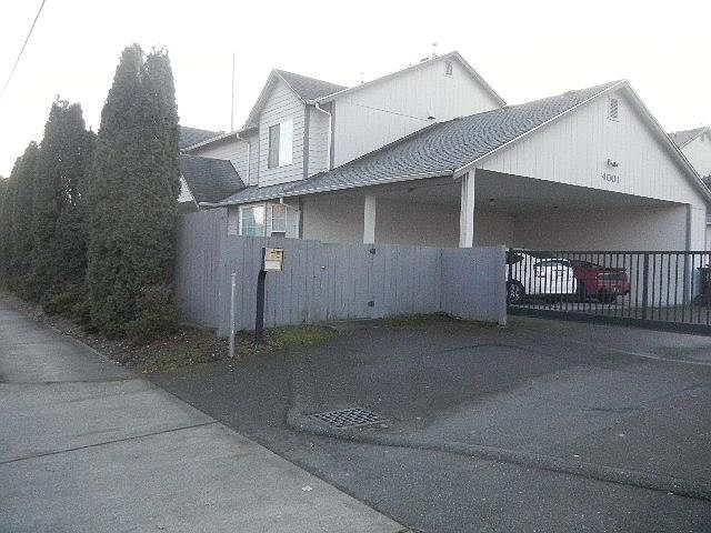 Gated entry with carport