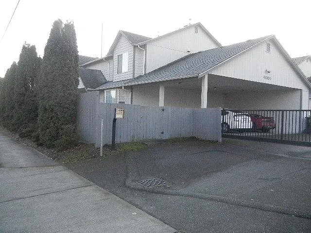 Gated entry with carport