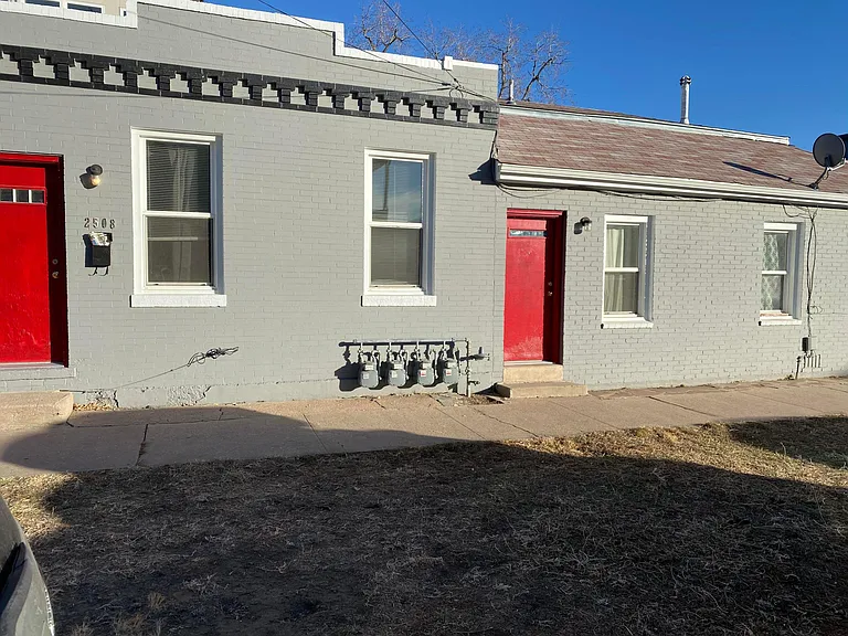 Side of unit - door on right to kitchen