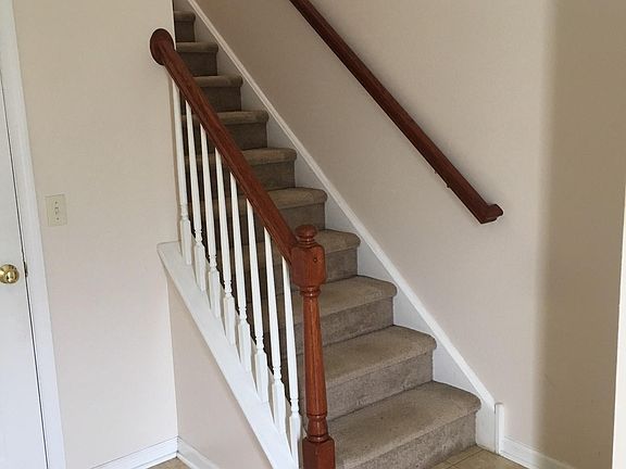 Stairs and coat closet