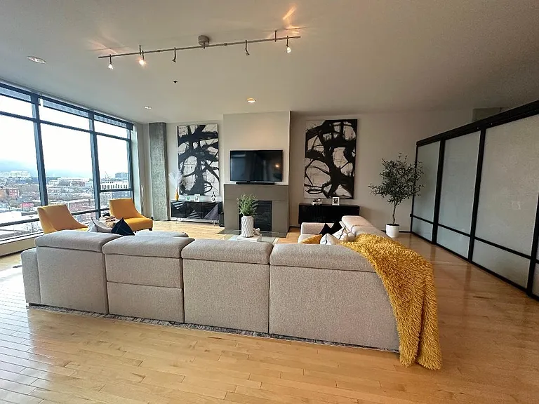 large living room area with gas fireplace