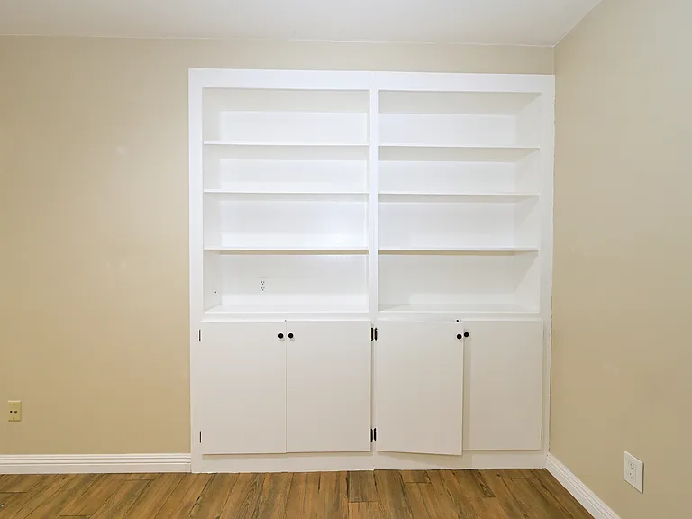 in-unit all-in-one laundry machine with plenty of storage cabinet