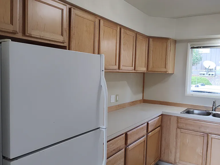 Well lit with an Abundance of cupboards and counter space