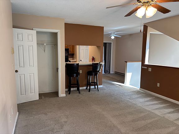 View from living room into kitchen window and dining area