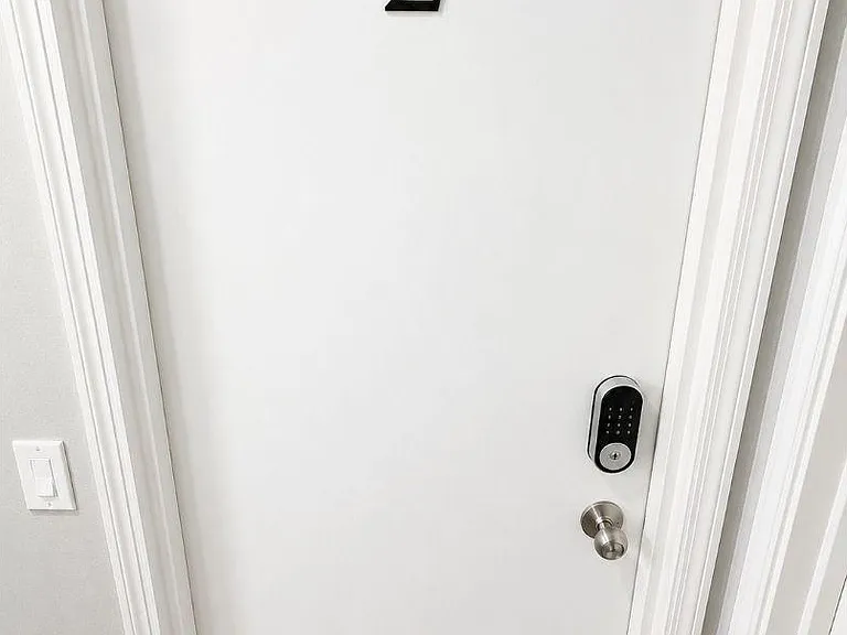Private interior room entry with secure keypad lock and numbered door for easy identification and access control.