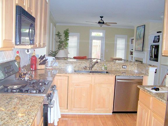 Kitchen looking into living room