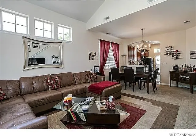 FORMER PICTURES with furniture: Living Room (no more read curtains, and the floors are now hardwood)